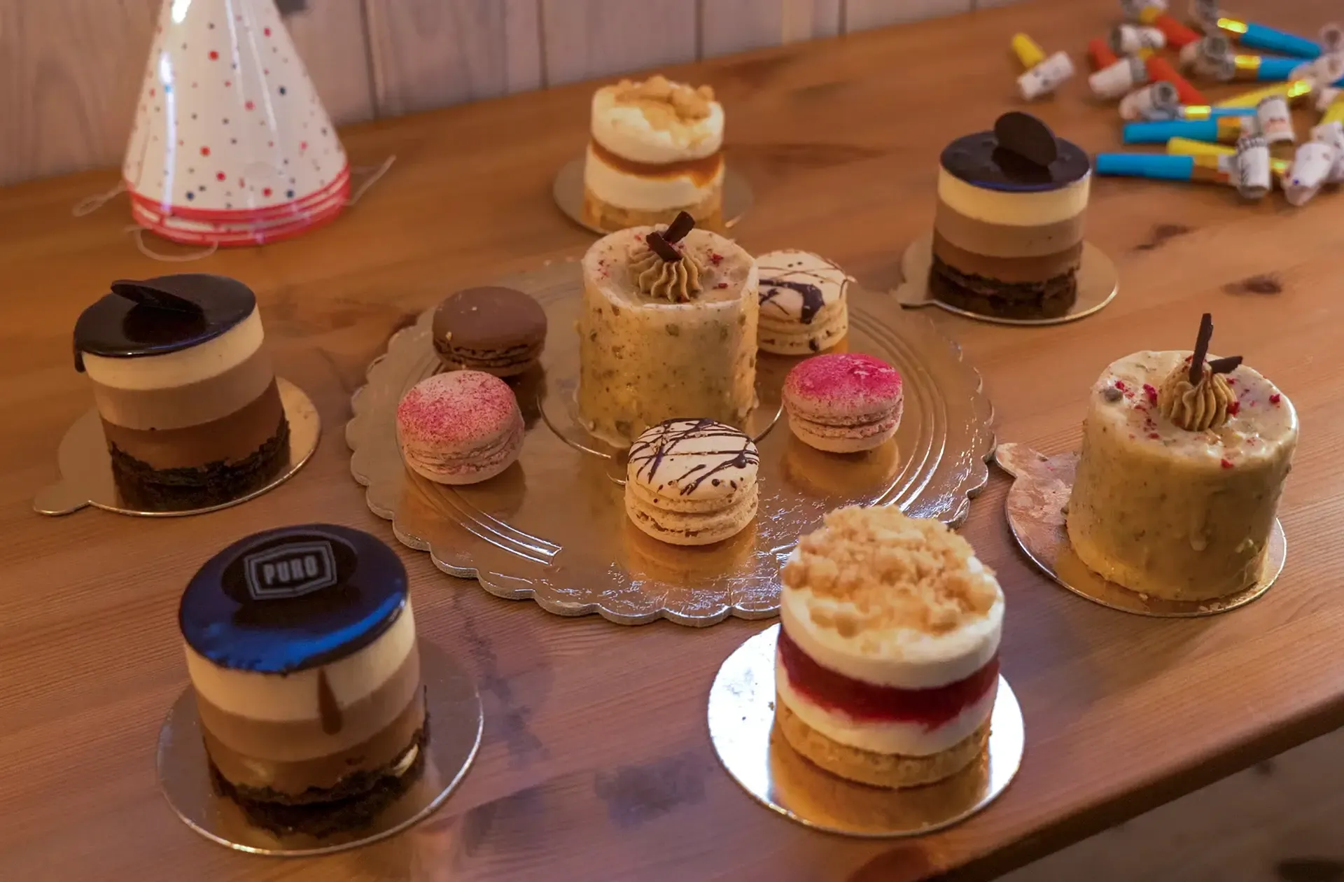Cakes and macarons on a party table